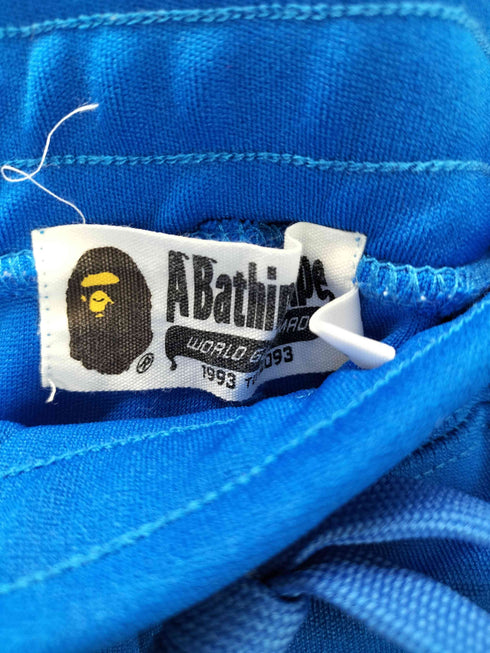アベイシングエイプ A BATHING APE MCMXCIII エイプ ヘッド プリント 裾ボタン トラック パンツ ジャージ メンズ JPN:M