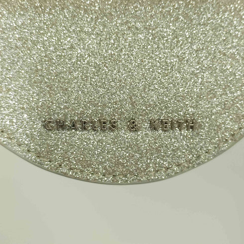 チャールズアンドキース CHARLES&KEITH エンベリッシュド セミサークルポーチ レディース