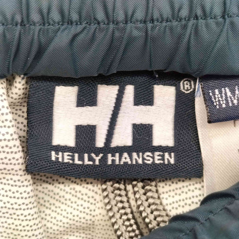 ヘリーハンセン HELLY HANSEN ロゴプリントナイロンパンツ レディース JPN:M