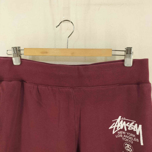 ステューシー Stussy ワールドツアー ロゴプリントスウェットパンツ メンズ L