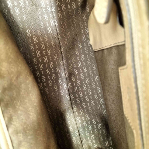 アニヤハインドマーチ ANYA HINDMARCH リボン総柄 型押し レザー ショルダーバッグ レディース