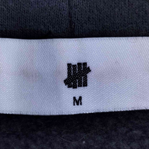 アンディフィーテッド UNDEFEATED USUGROW アーチロゴ プルオーバーパーカー レディース JPN:M