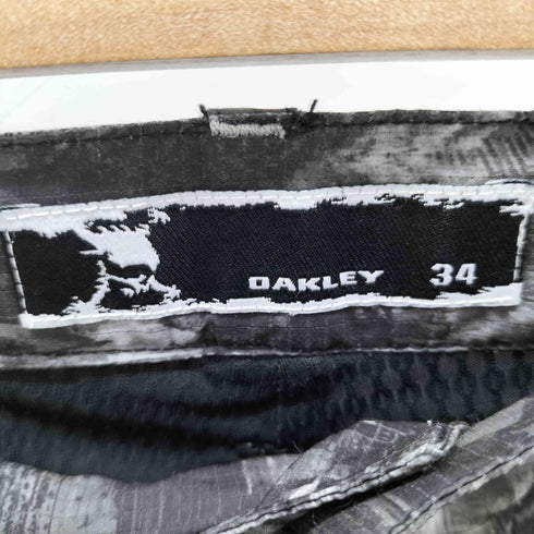 オークリー OAKLEY スカルロゴ刺繍総柄ハーフパンツ メンズ 34inch