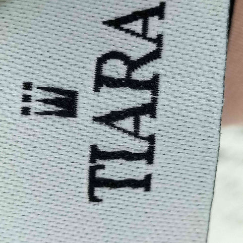 ティアラ Tiara シアーボリュームペプラムブラウス レディース