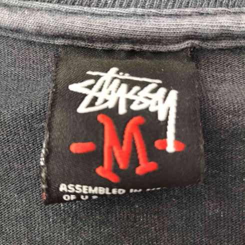 ステューシー Stussy the world wide super rockin フロントプリントtシャツ メンズ JPN:L