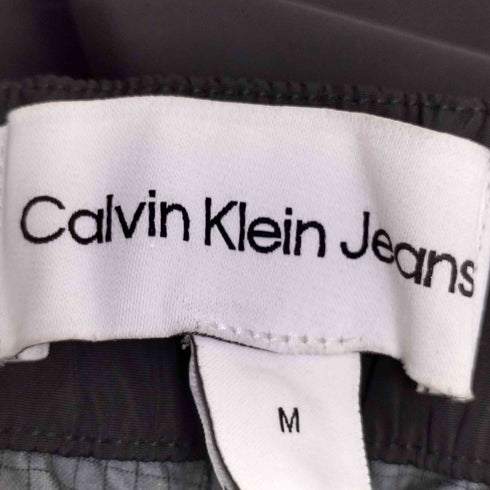 カルバンクラインジーンズ Calvin Klein Jeans 裾ドローコード ナイロンパンツ メンズ import:M