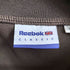 リーボック Reebok トラックジャケット レディース import:L
