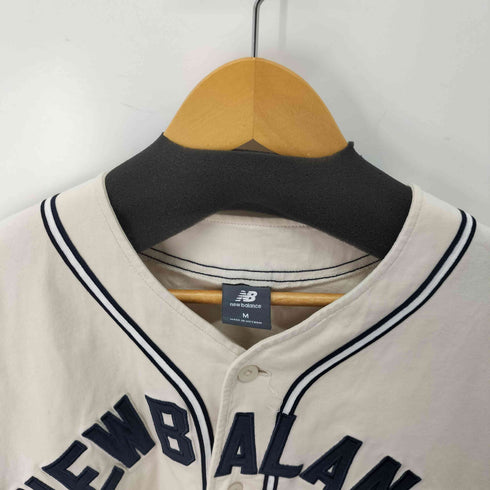 ニューバランス NEW BALANCE Sportswear Greatest Hits ベースボールシャツ メンズ import:M