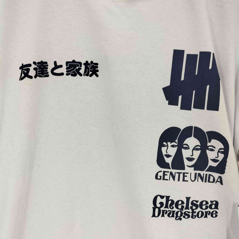 アンディフィーテッド UNDEFEATED Chelsea Drugstore Gente Unida L/S TEE メンズ import:XL