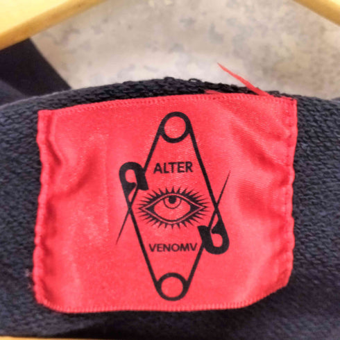 オルターベノム ALTER VENOMV 総柄プリントオーバーサイズプルオーバーパーカー メンズ