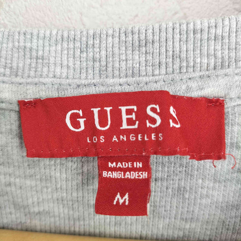 ゲス GUESS ロゴ エンボス トップス メンズ import:M
