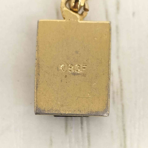 K18刻印 ゴールド ブラックストーン ネックレストップ 約1g レディース