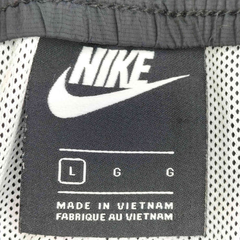ナイキ NIKE サイドボタン テーパード トラック パンツ メンズ JPN:L