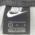 ナイキ NIKE サイドボタン テーパード トラック パンツ メンズ JPN:L