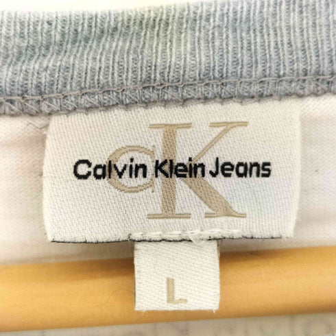 カルバンクラインジーンズ Calvin Klein Jeans SOMETHING BEGINNING WITH C プリント リンガーTシャツ メンズ import:L