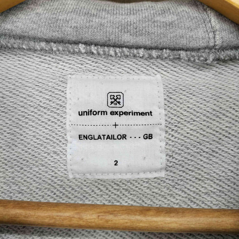 ユニフォームエクスペリメント uniform experiment G.B.NAVTプリント プルオーバーパーカー メンズ JPN:2