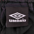アンブロ UMBRO 24SS 別注 ベクターロゴ 刺繍 パイピングライン ナイロン トラック パンツ ジャージ メンズ L