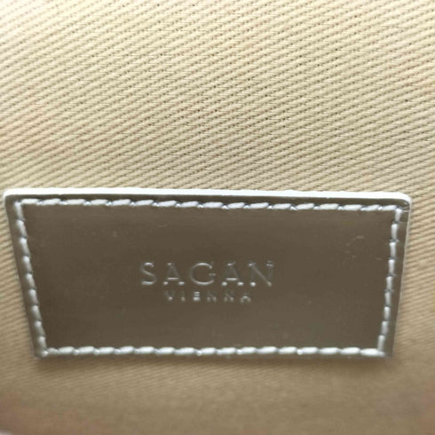 SAGAN VIENNA ロゴプレートメタリックバッグ レディース