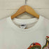 フロントキャラクタープリントクルーネックTシャツ メンズ XL