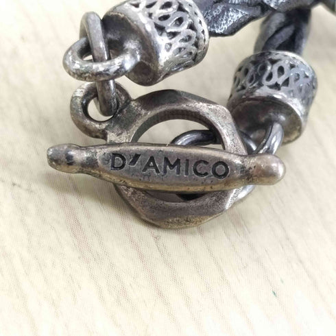 D'AMICO ターコイズレザー編み込みブレスレット レディース