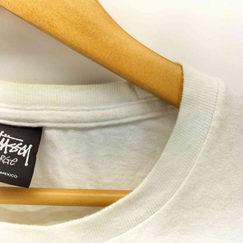 ステューシー Stussy ワンポイント ストックロゴ 刺繍 裾 プリント S/S クルーネック Tシャツ メンズ import:L