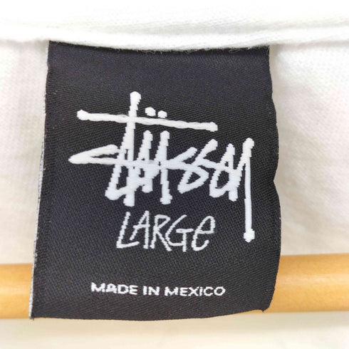 ステューシー Stussy ワンポイント ストックロゴ 刺繍 裾 プリント S/S クルーネック Tシャツ メンズ import:L
