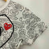 プレイコムデギャルソン PLAY COMME des GARCONS アニメコラボ ハートワッペン 総柄 半袖Tシャツ レディース JPN:M