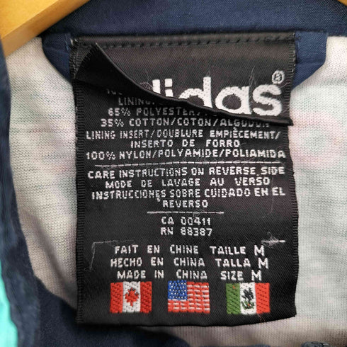 アディダス adidas 90S 万国旗 刺繍 タグ スイッチングカラー カーブ ストライプライン ナイロン トラック ブルゾン ジャケット メンズ import:M