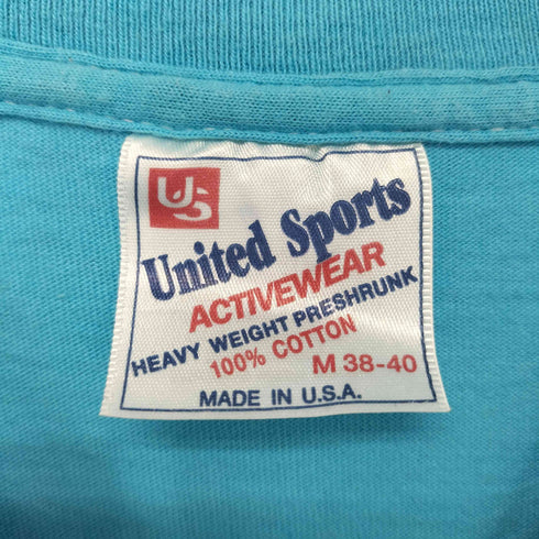 ユナイテッドスポーツ UNITED SPORTS 90-00s USA製 バンドロゴプリント クルーネック カットソー メンズ import:M