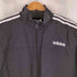 アディダス adidas エッセンシャルウーブントラックジャケット メンズ import:M