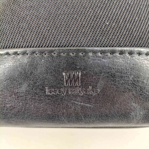 アイムイッセイミヤケ im ISSEY MIYAKE レザー ナイロン 巾着バッグ メンズ