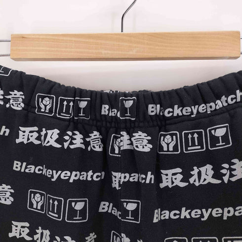ブラックアイパッチ Black Eye Patch HANDLE WITH CARE SWEAT PANTS メンズ JPN:L