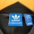 アディダスオリジナルス adidas Originals SST TRACK TOP BERLIN 異素材 切替 トレフォイル ロゴ ダブルジップ クロップド トラック ジャケット レディース JPN:M