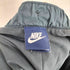 ナイキ NIKE ワンポイント刺繍イージーパンツ メンズ L