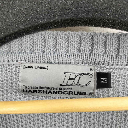 ハーシュアンドクルーエル HARSHANDCRUEL バックプリント ダメージ加工 ニット メンズ import:M