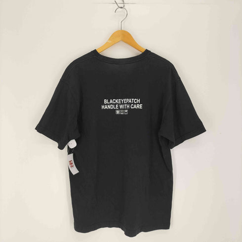 ザブラックアイパッチ THE BLACK EYE PATCH HANDLE WITH CARE 取扱注意 両面プリント S/S クルーネック Tシャツ メンズ JPN:L