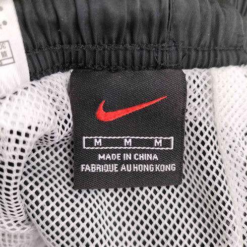 ナイキ NIKE スウッシュ刺繍 パイピング ナイロンパンツ メンズ JPN:M