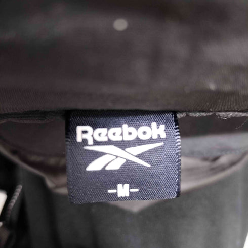リーボック Reebok 24AW 別注 ロゴ刺繍 オーバーサイズ ナイロントラックブルゾン メンズ import:M