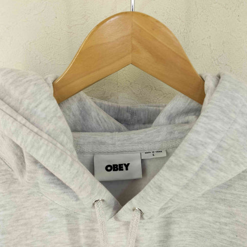 オベイ OBEY TRIPLE TROUBLE OBEY INVADER HOODIE メンズ L