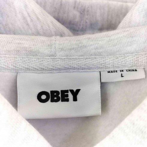オベイ OBEY TRIPLE TROUBLE OBEY INVADER HOODIE メンズ L