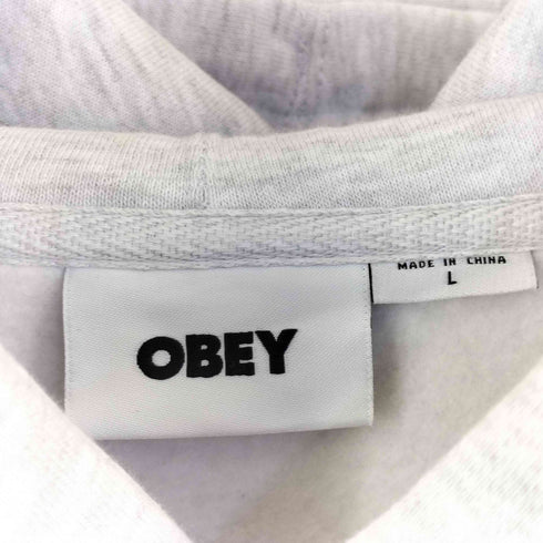 オベイ OBEY TRIPLE TROUBLE OBEY INVADER HOODIE メンズ L