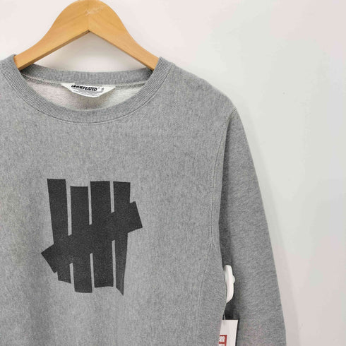 アンディフィーテッド UNDEFEATED ロゴプリント 裏起毛 クルーネックスウェット メンズ JPN:S