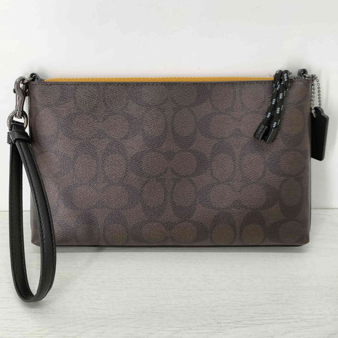 コーチ COACH SIGNATURE CANVAS WITH DINOSAUR MOTIF LARGE WRISTLET レディース