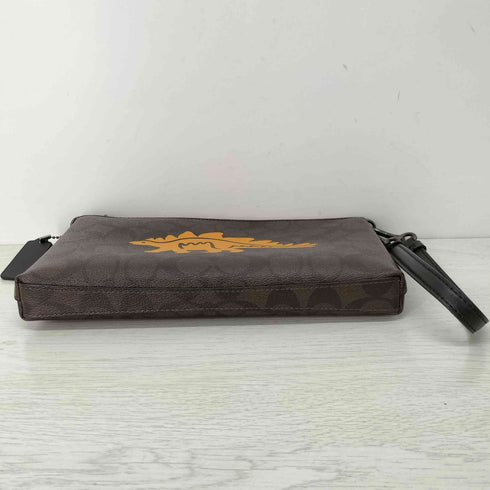 コーチ COACH SIGNATURE CANVAS WITH DINOSAUR MOTIF LARGE WRISTLET レディース