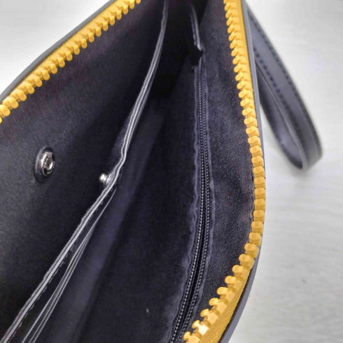 コーチ COACH SIGNATURE CANVAS WITH DINOSAUR MOTIF LARGE WRISTLET レディース