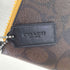 コーチ COACH SIGNATURE CANVAS WITH DINOSAUR MOTIF LARGE WRISTLET レディース