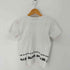 ブラックコムデギャルソン BLACK COMME des GARCONS ヘムロゴ プリント Tシャツ ピチT レディース JPN:S