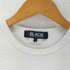 ブラックコムデギャルソン BLACK COMME des GARCONS ヘムロゴ プリント Tシャツ ピチT レディース JPN:S