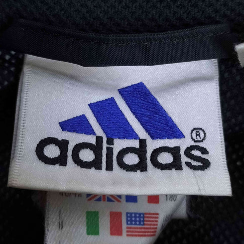 アディダス adidas 90s 万国旗タグ トレフォイルロゴ サッカーチームエンブレム刺繍 裾ドローコード 袖スリーライン フードパッカブル ナイロンジャケット メンズ O