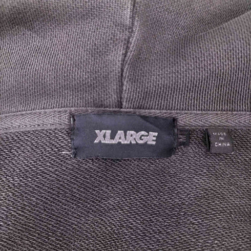 エクストララージ XLARGE PIGMENT DYED EMBOSS LOGO ZIP HOODED SWEAT メンズ import:M